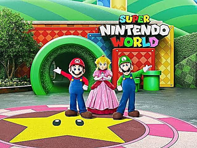 Mario, la Princesa Peach y Luigi en la entrada de Super Nintendo World, en Epic Universe (Universal Orlando)